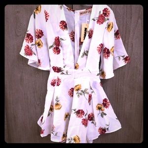 Reverse floral romper *with tags*